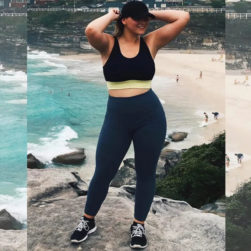 "Women's Plus Size High-Waisted Yoga Leggings with Pockets | Tummy Control Hip-Hugging Workout Solid Colors Tights for Gym