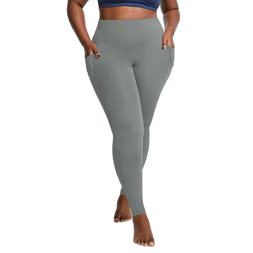 "Women's Plus Size High-Waisted Yoga Leggings with Pockets | Tummy Control Hip-Hugging Workout Solid Colors Tights for Gym