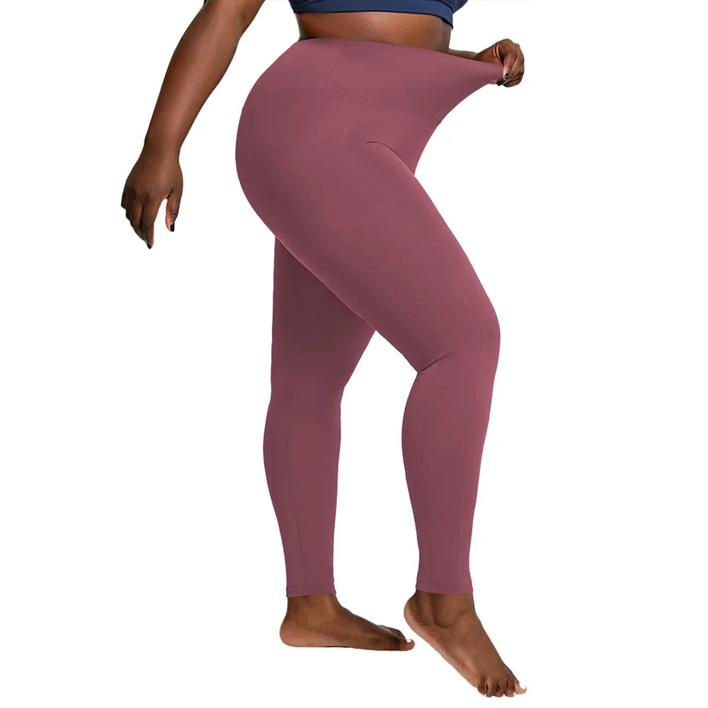 "Women's Plus Size High-Waisted Yoga Leggings with Pockets | Tummy Control Hip-Hugging Workout Solid Colors Tights for Gym